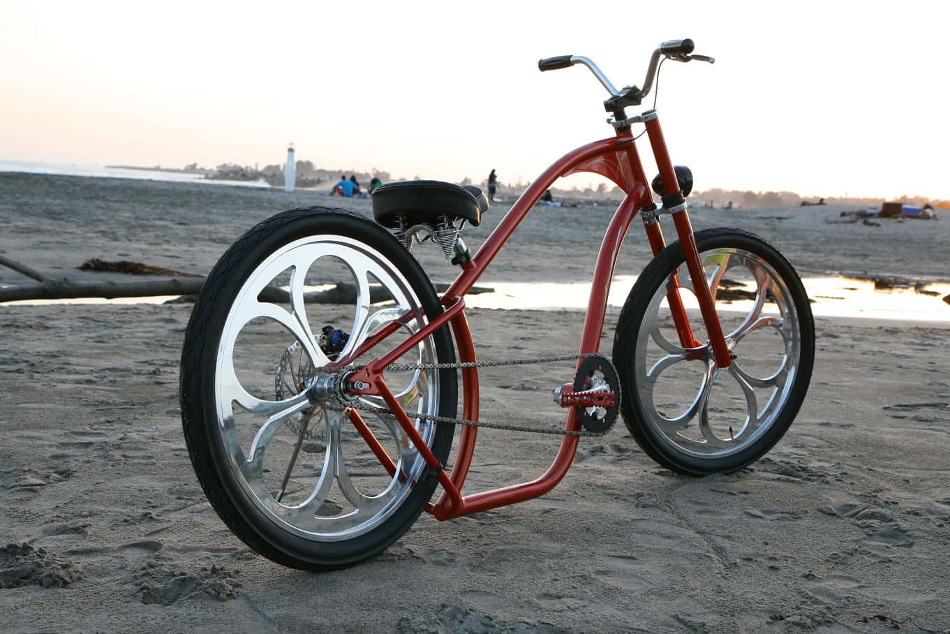 A retro beach cruiser bike parked on a beautiful sandy beach Wallpaper