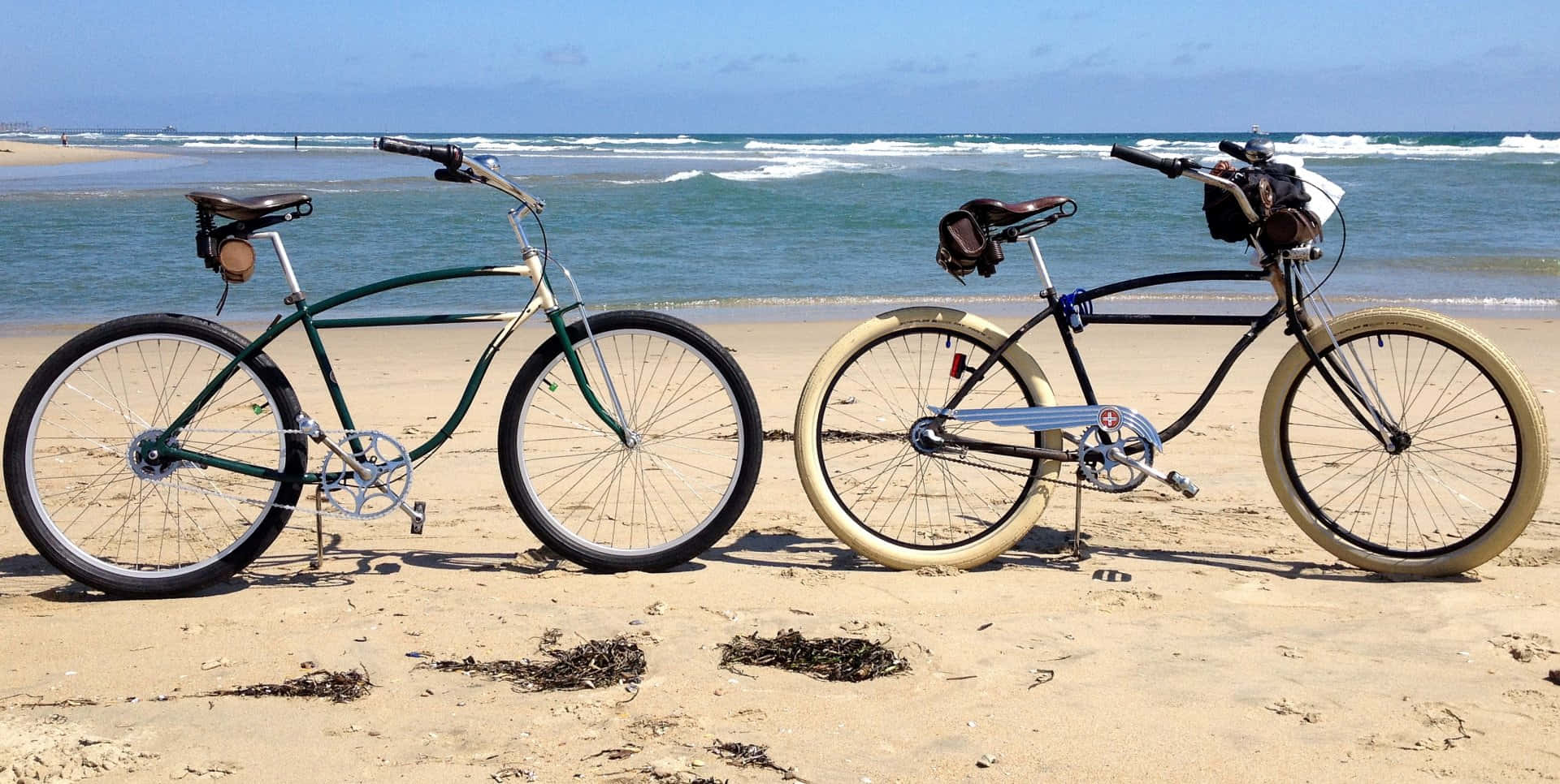 Stylish Beach Cruiser Bike in a Serene Beach Setting Wallpaper