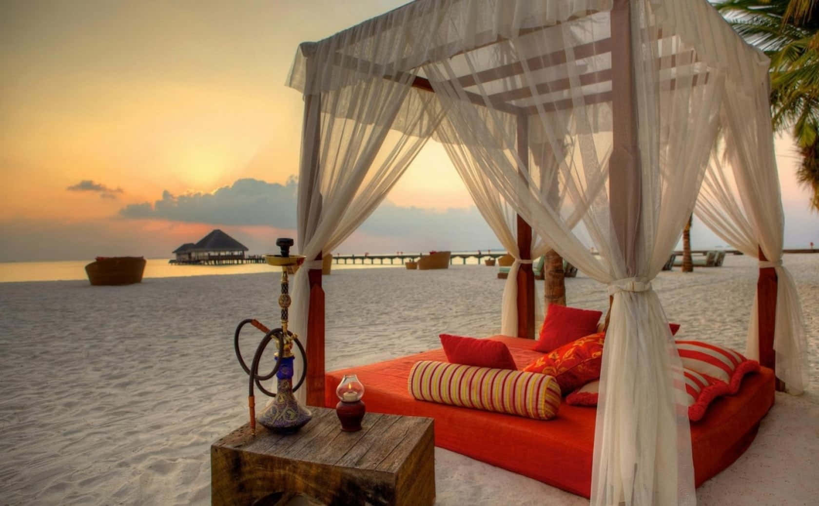 Relaxing Beach Daybed Retreat Wallpaper