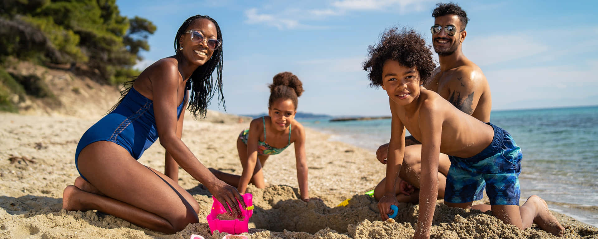 Whole-hearted Bonding - A Beach Family Sharing a Joyful Moment