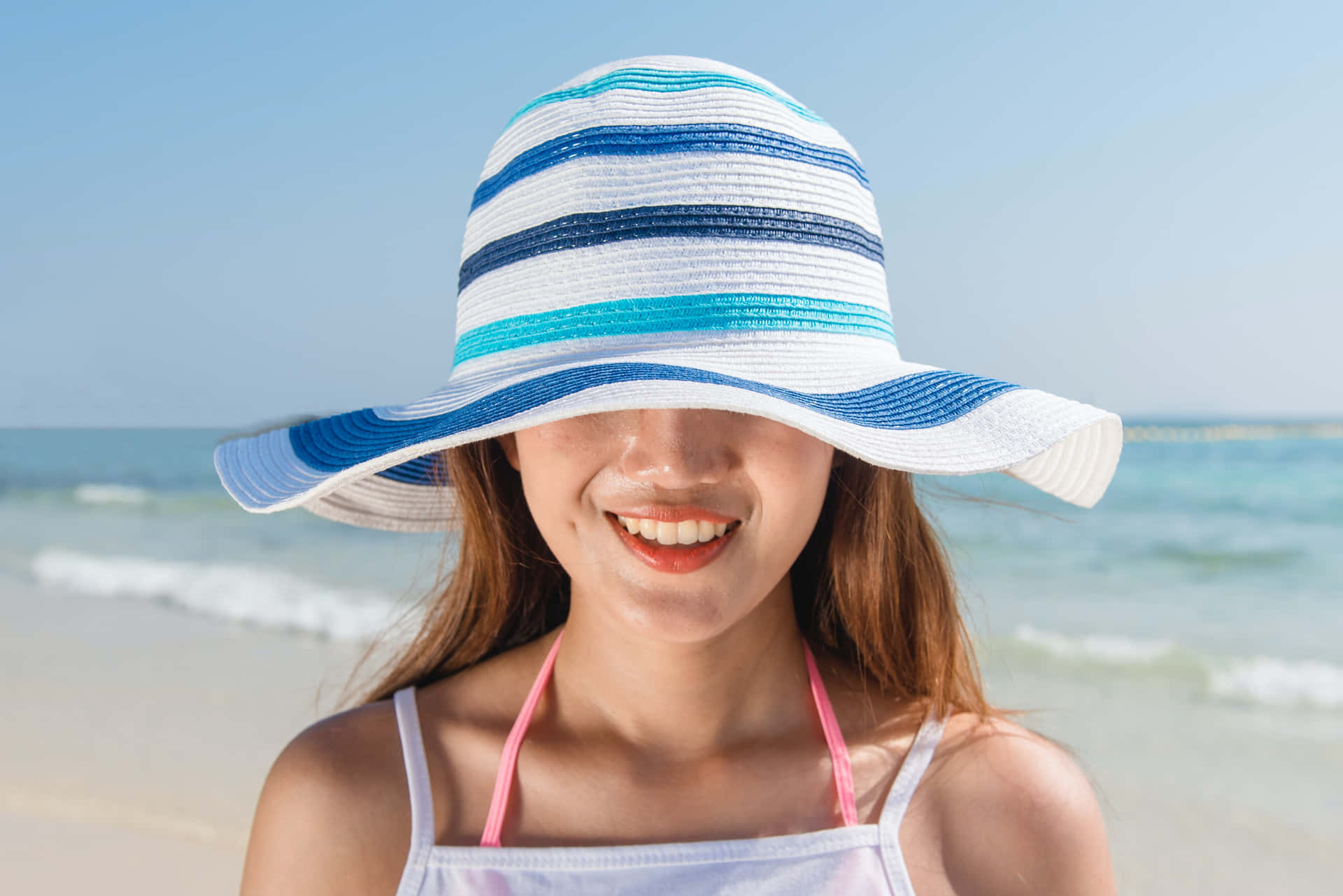 Tropical Beach Hat on Sunlounger Wallpaper