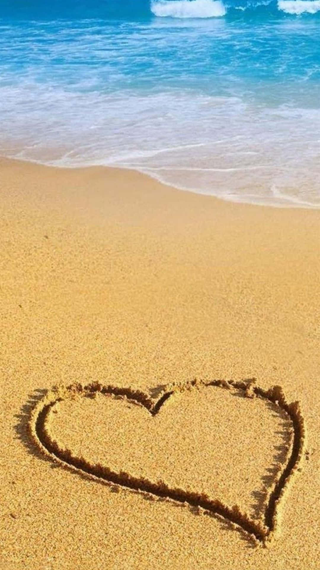A Romantic Moment on the Beach Wallpaper