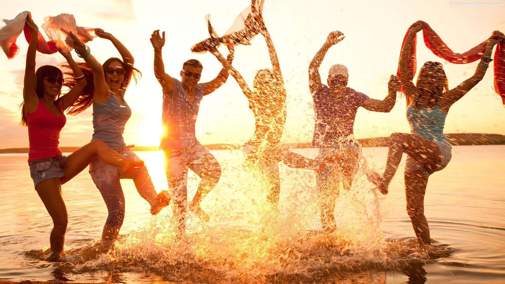 A Vibrant Beach Party Celebration Wallpaper