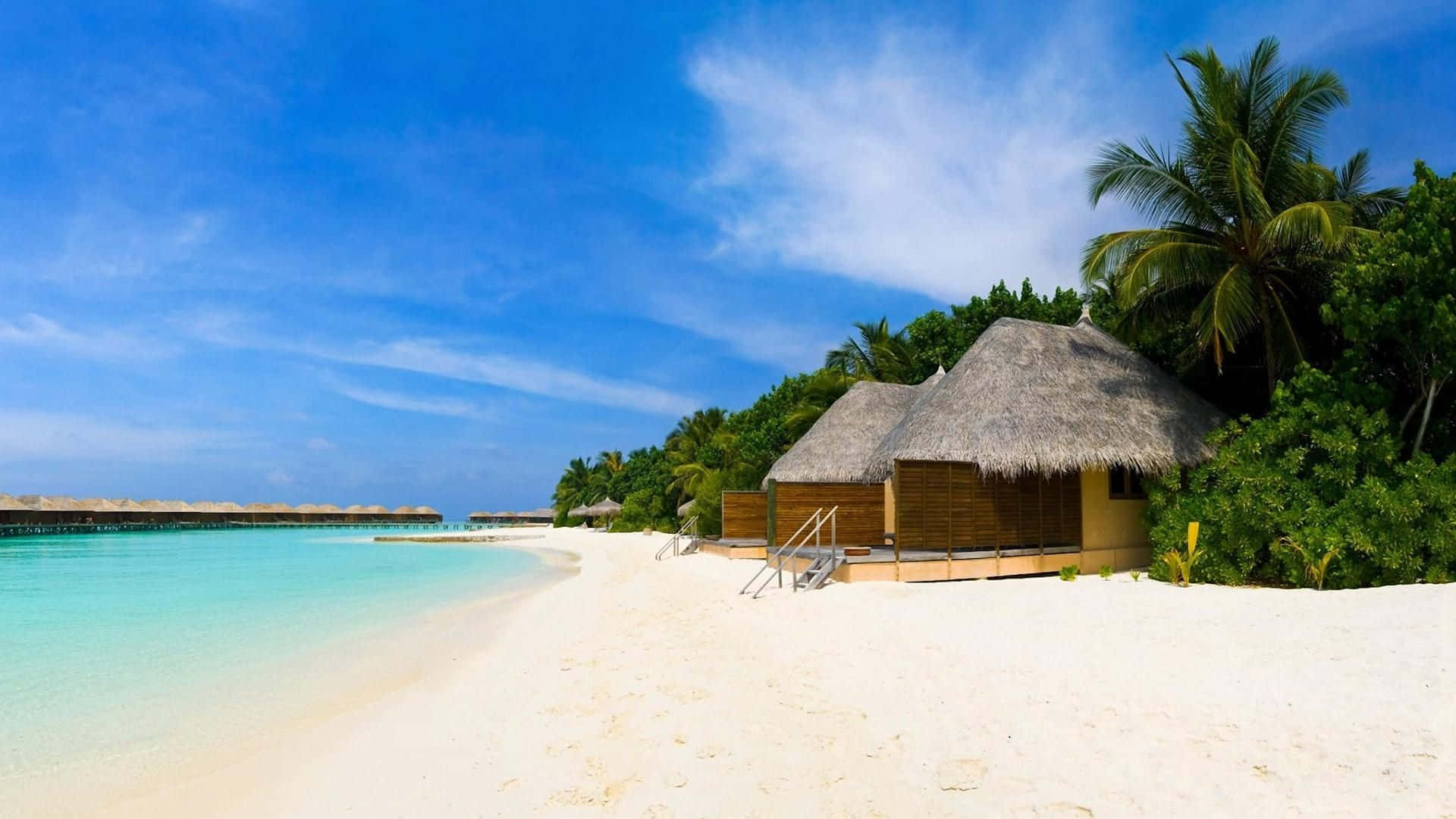 Relax in Paradise at our Luxurious Beach Resort! Wallpaper