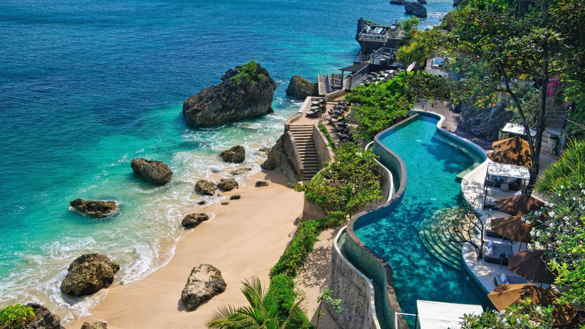 Resortdi Lusso Sulla Spiaggia A Bali, Indonesia. Sfondo