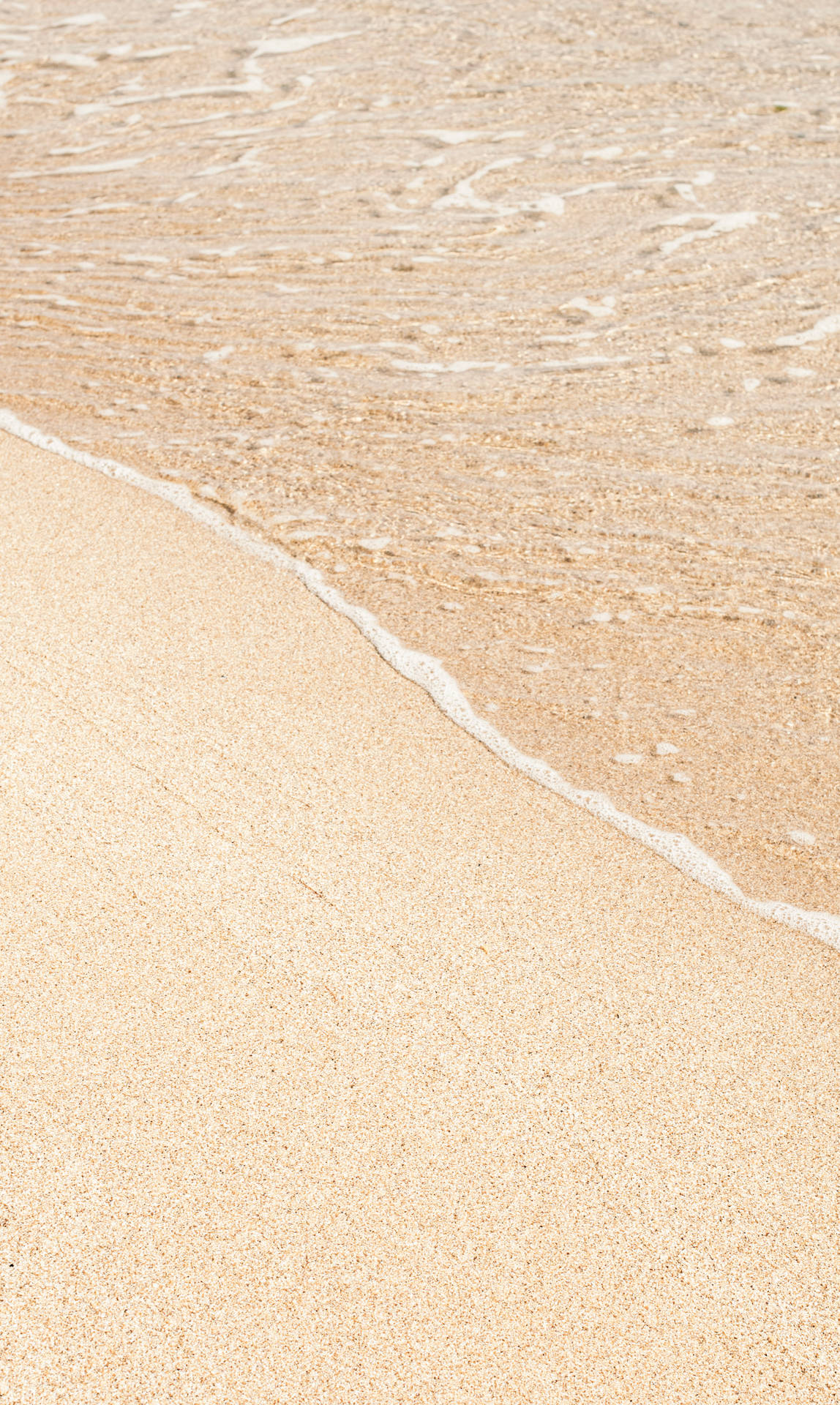 Beach Sand With Beige Background Wallpaper