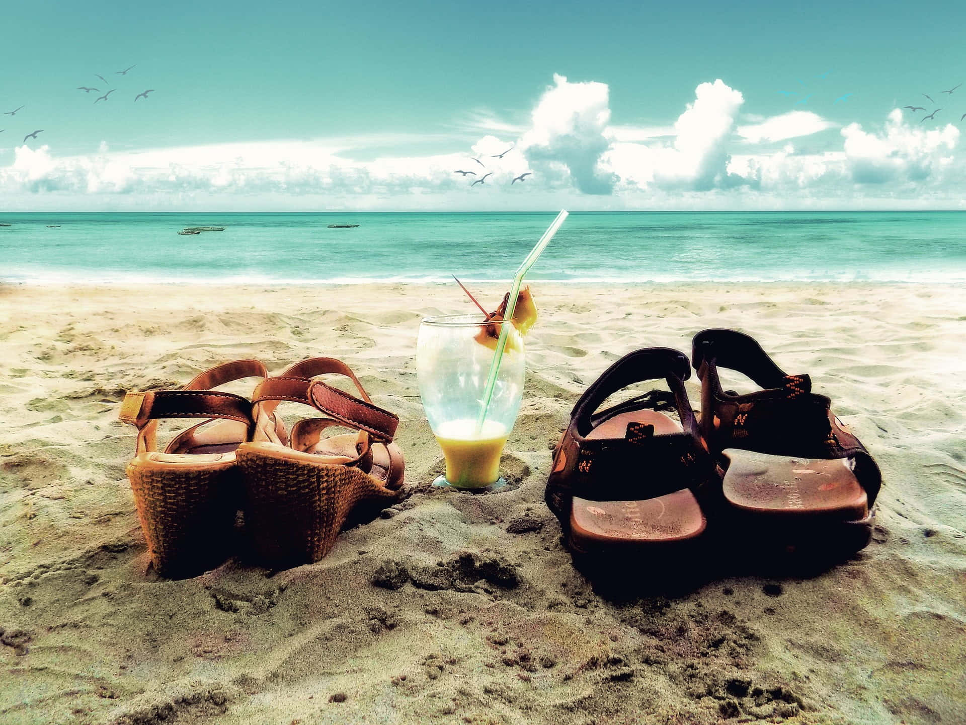 Beach Sandals on a Sunny Seaside Wallpaper