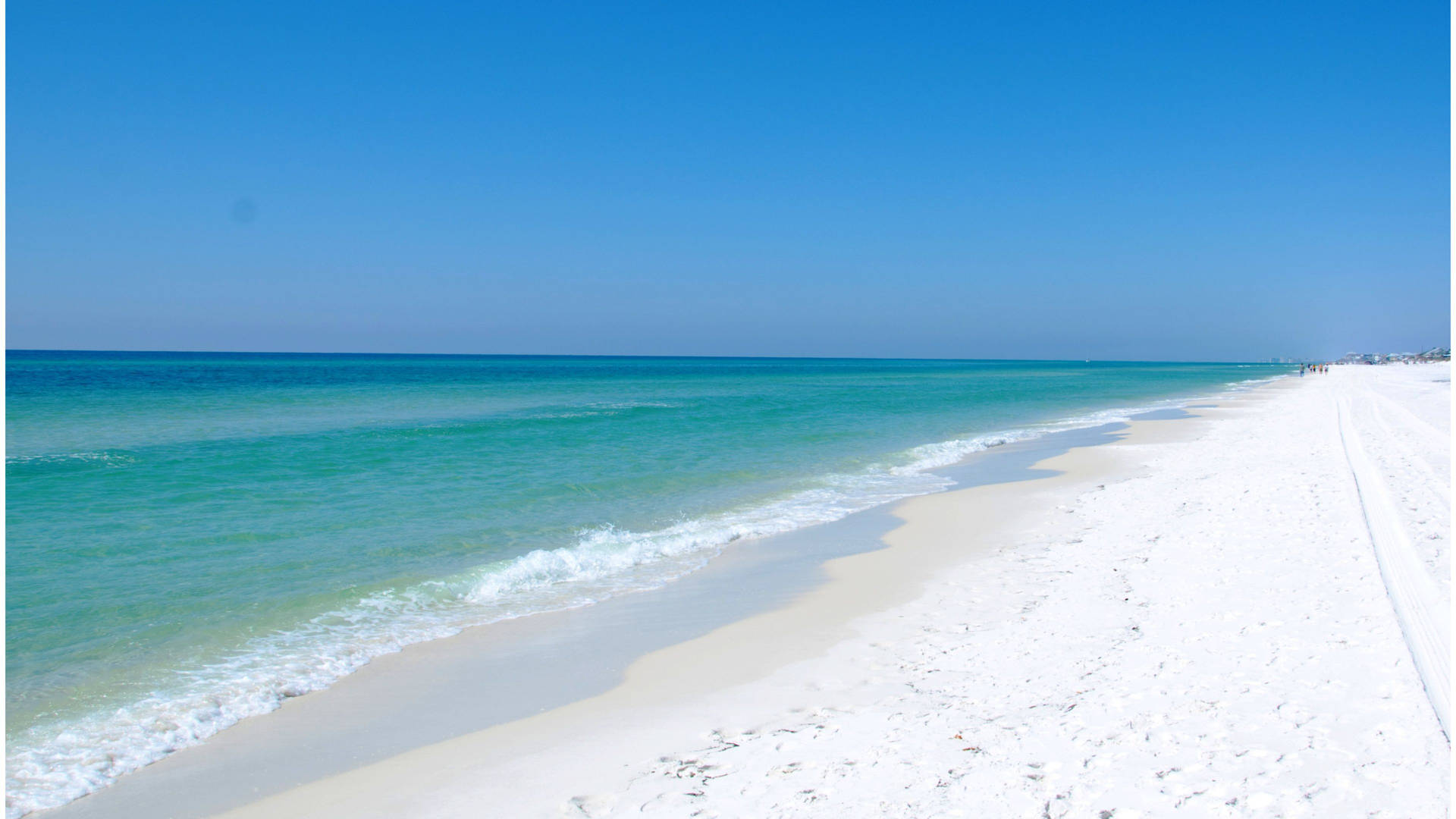 Unaspiaggia Di Sabbia Bianca Sfondo