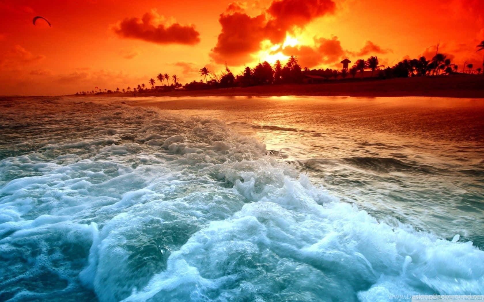 Erlebensie Die Schönheit Eines Strandsonnenuntergangs Als Hintergrundbild Auf Ihrem Nächsten Desktop Wallpaper