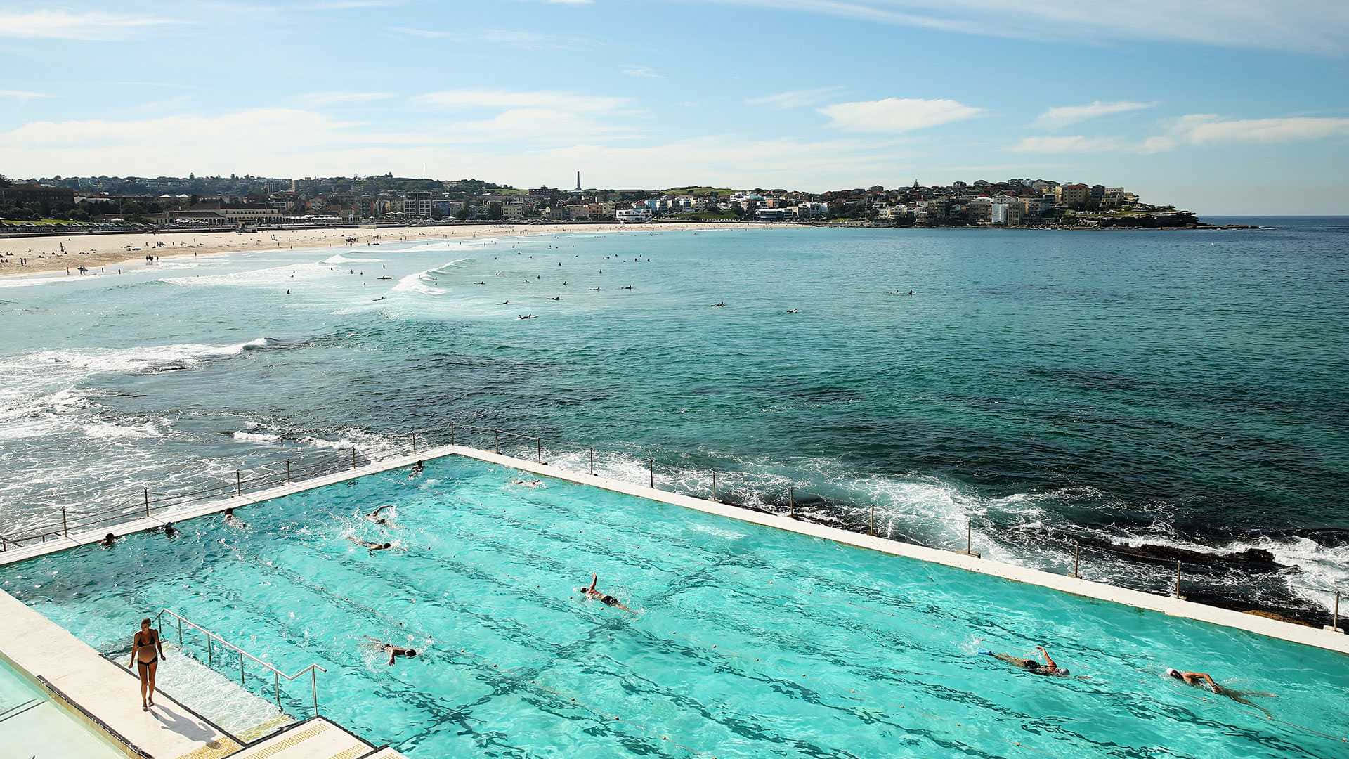 Relaxing Beach Swimming Pool Overlooking the Ocean Wallpaper