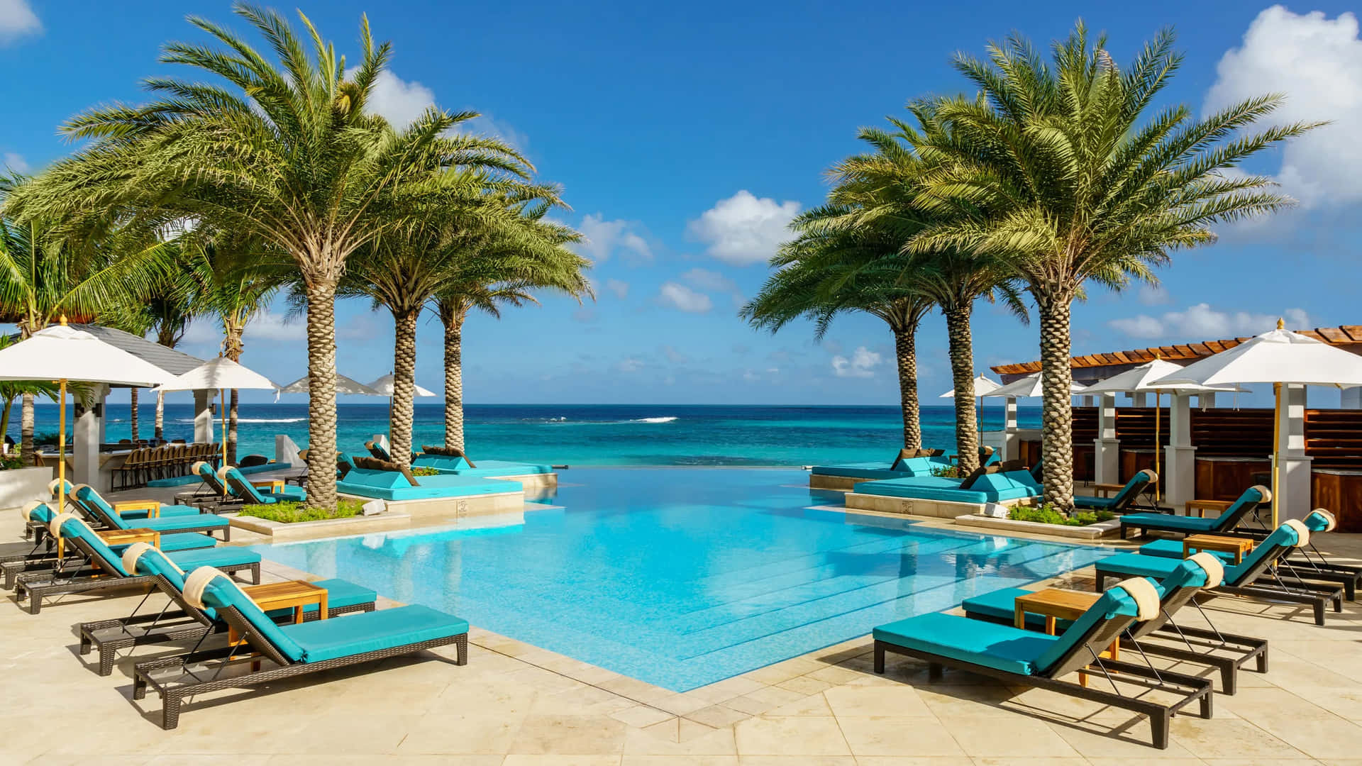 Download Stunning Beach Swimming Pool Overlooking the Ocean Wallpaper ...