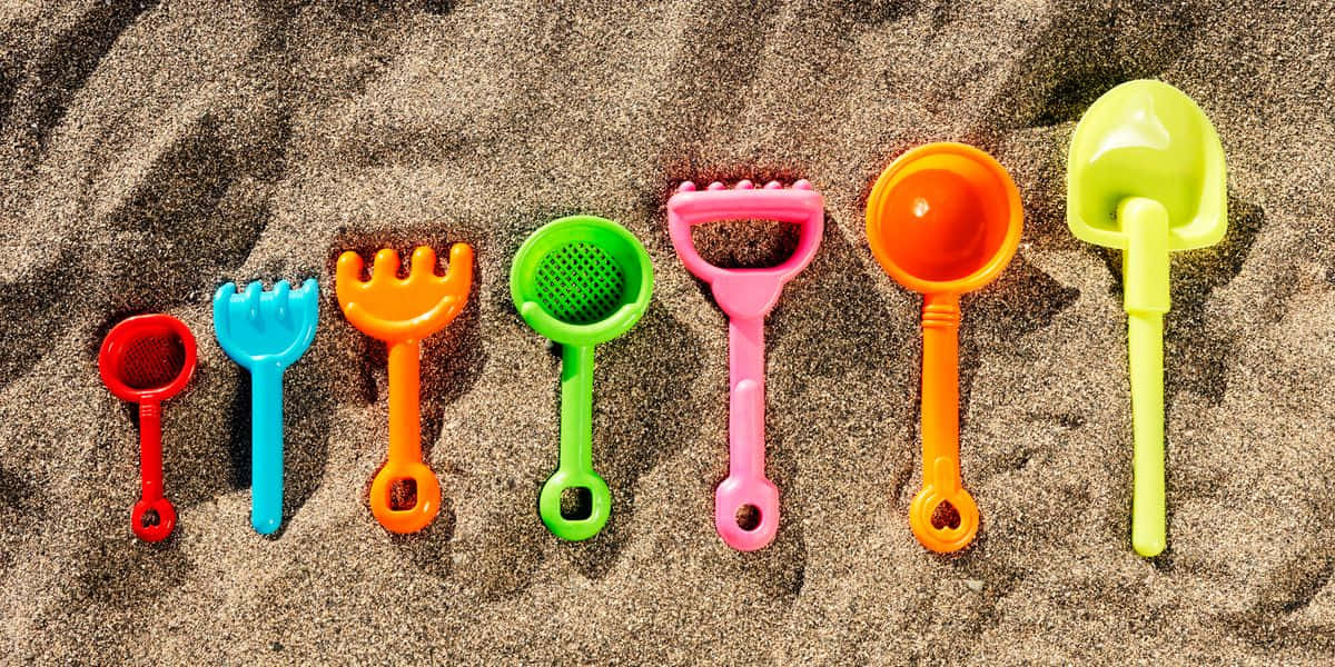 Vibrant Beach Toys Collection Wallpaper