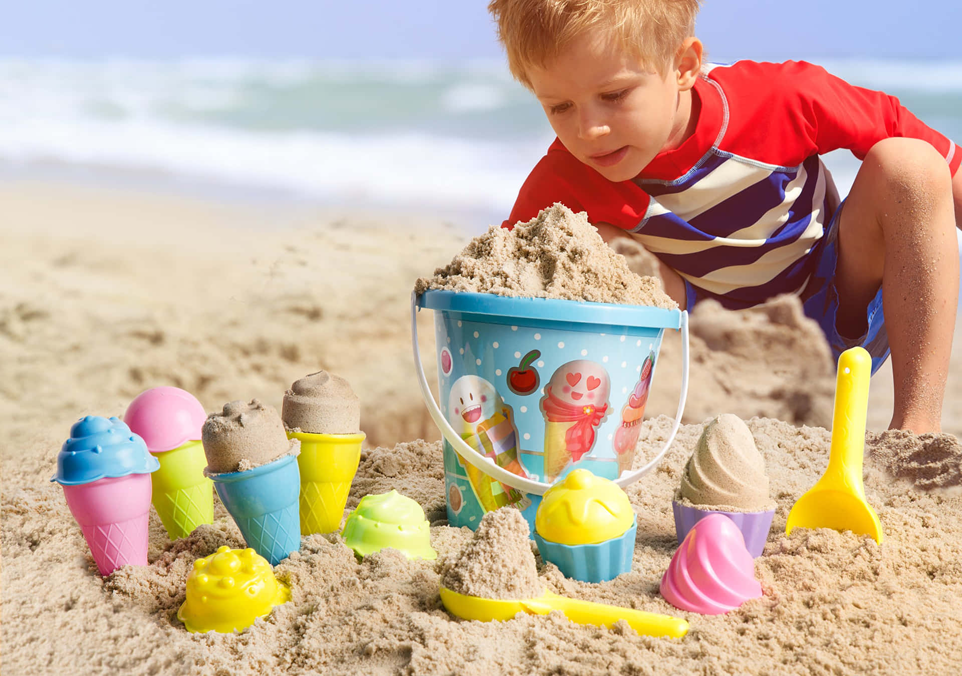 Colorful Beach Toys on a Sunny Day Wallpaper