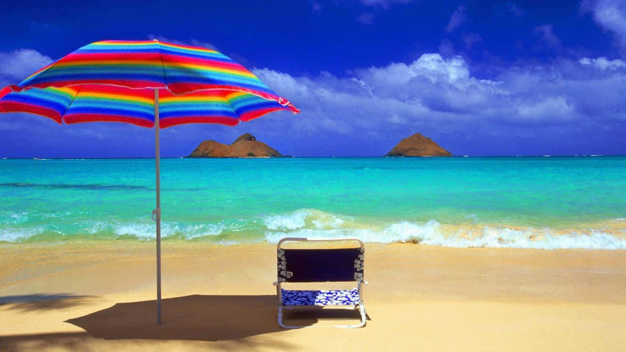 Colorful Beach Umbrella on a Sunny Day Wallpaper