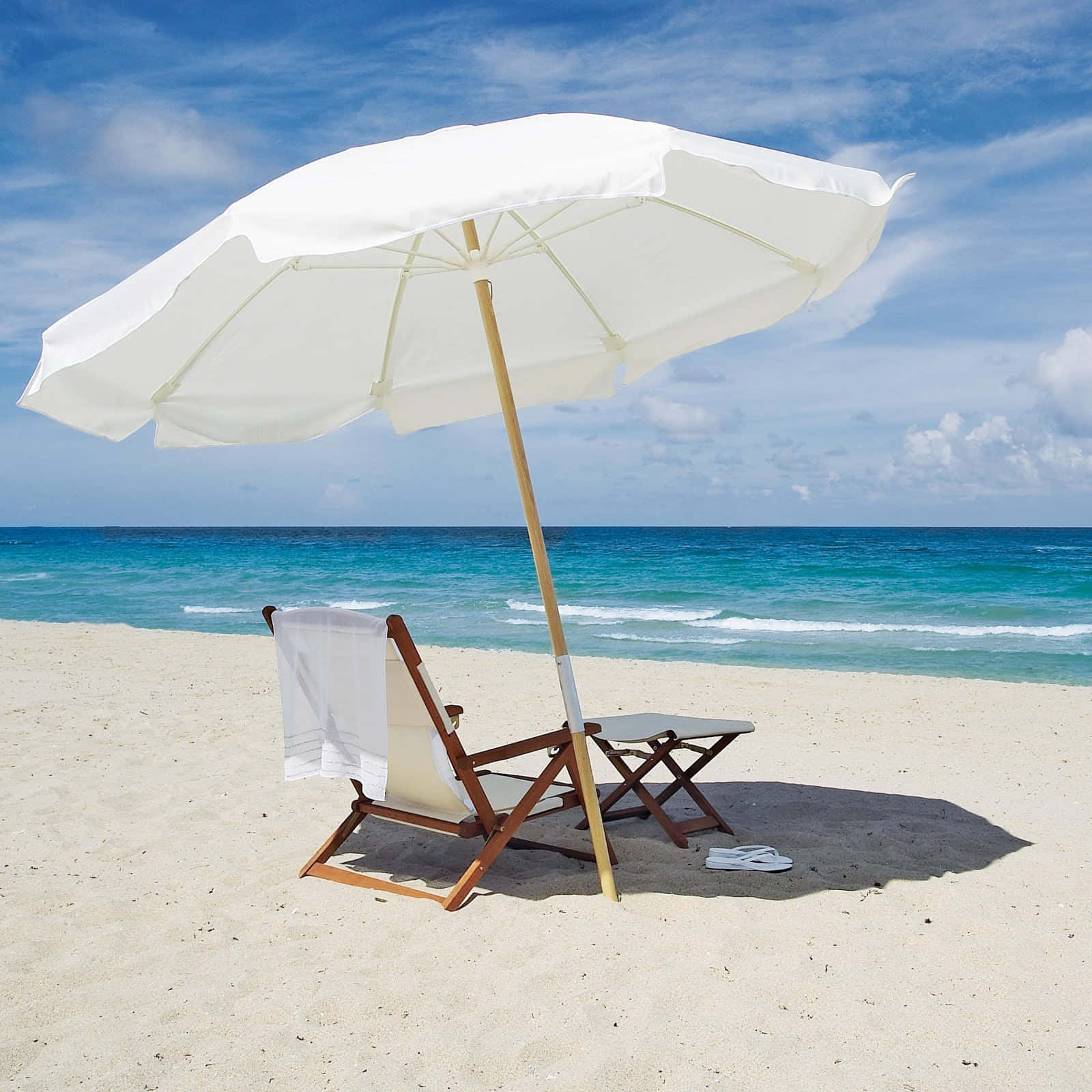 Tropical Beach with Colorful Umbrella and Sun Chairs Wallpaper