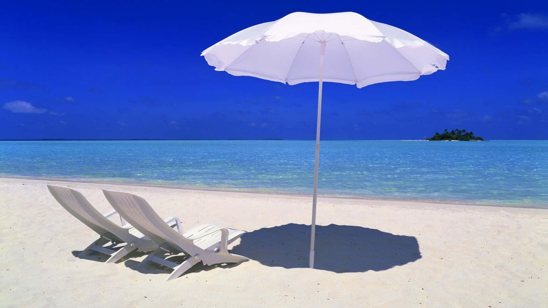 Tropical Beach Getaway with Vibrant Beach Umbrella Wallpaper