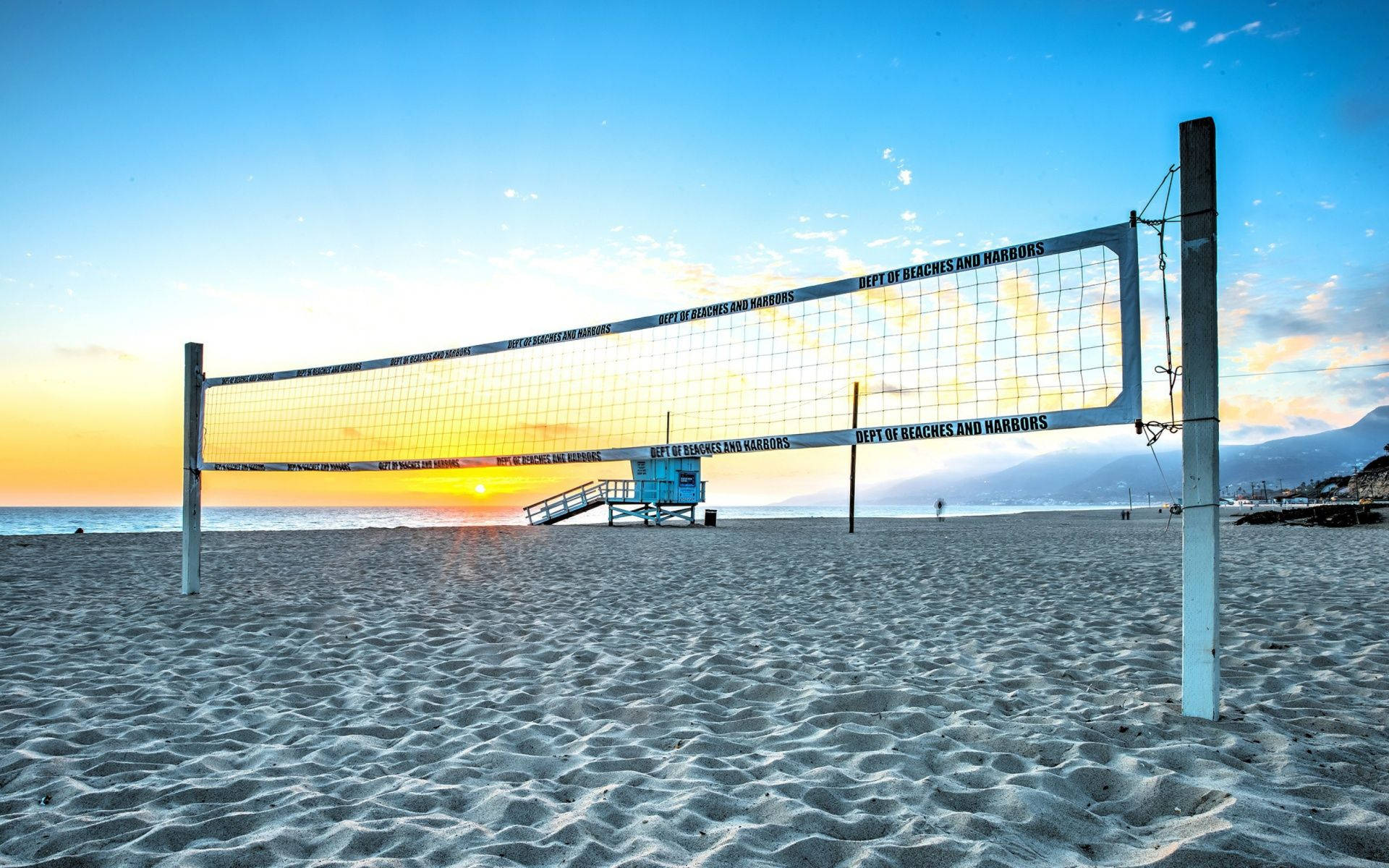 Beach Volleyball Net And Lifeguard Post Wallpaper