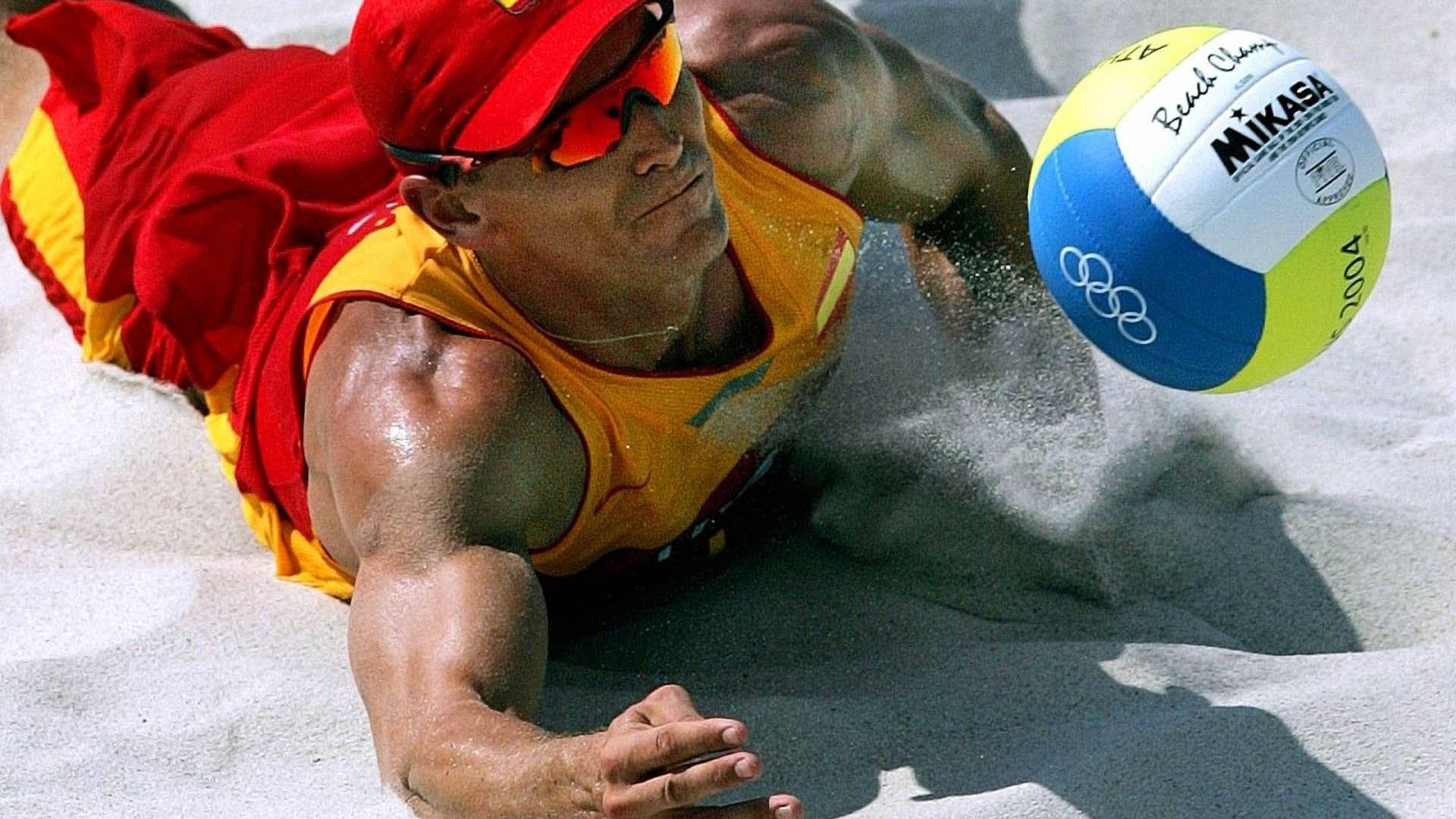 Beach Volleyball Player Javier Bosma Digging A Ball Wallpaper