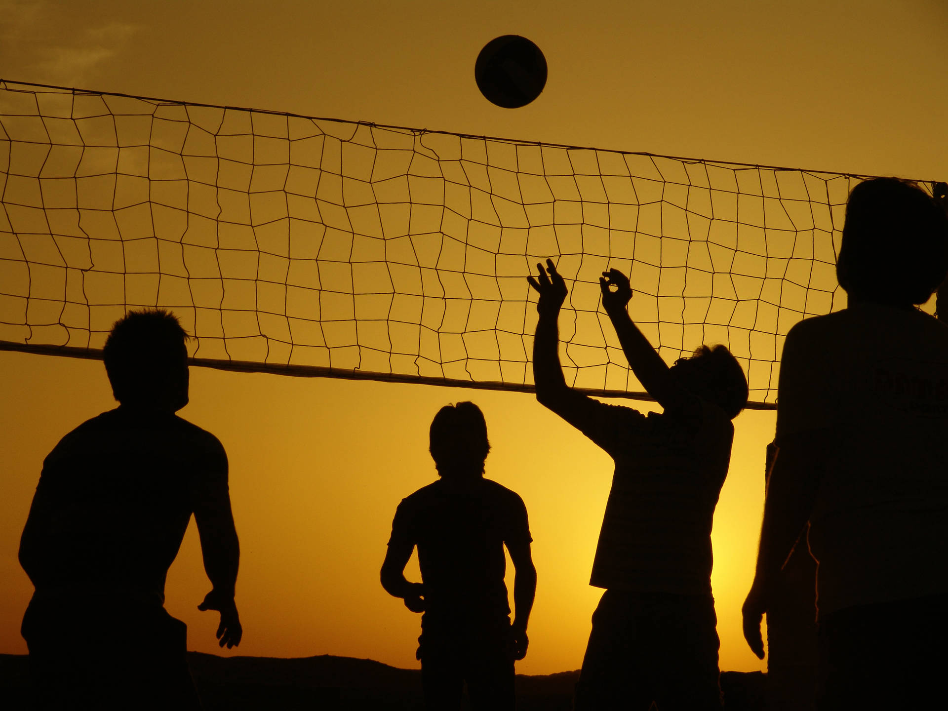 Beach Volleyball Silhouette Of Players Wallpaper
