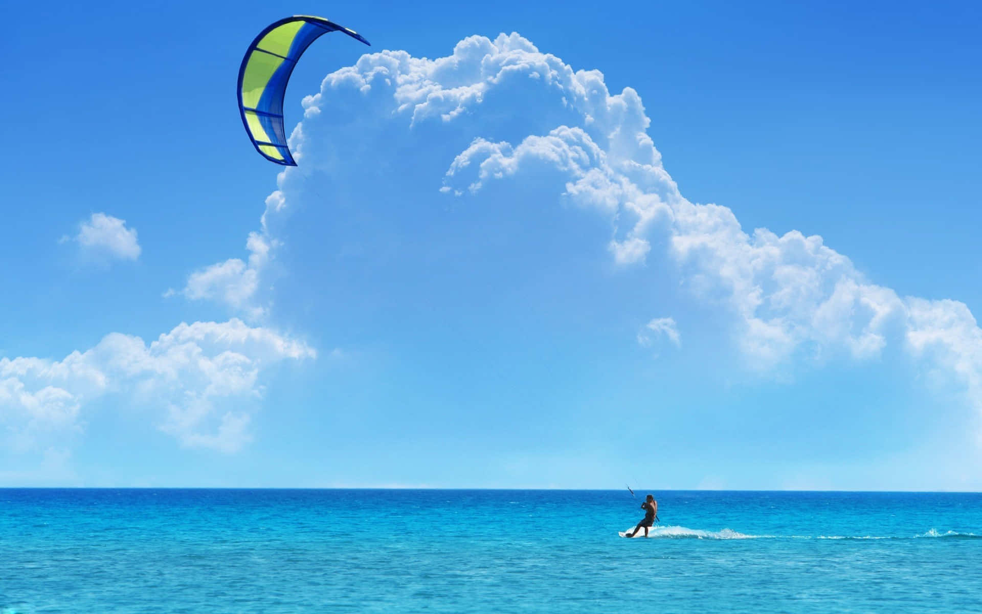 Exciting Beach Water Sports Action Wallpaper