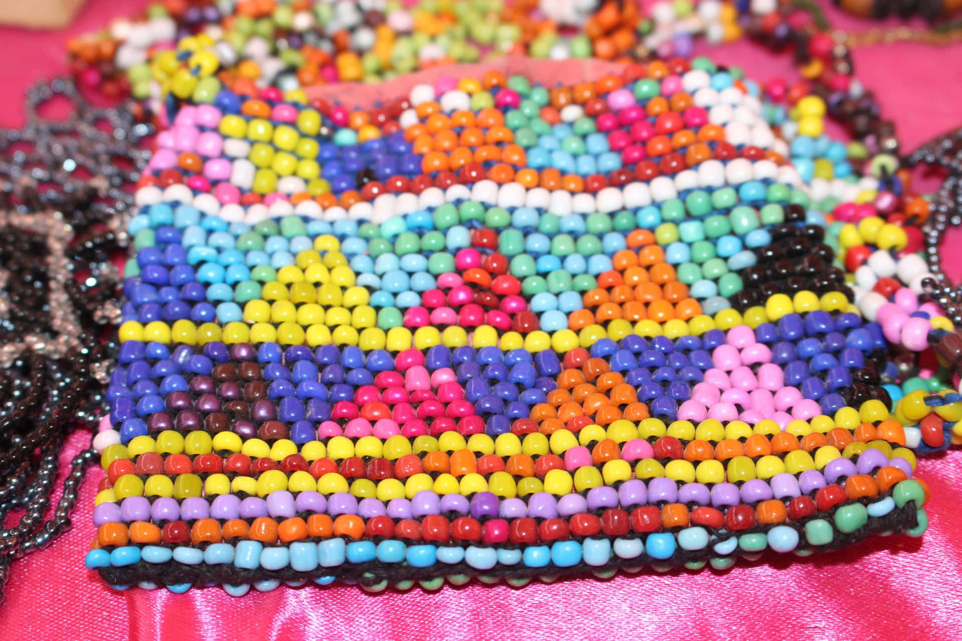 A Colorful Bag With Beads On It