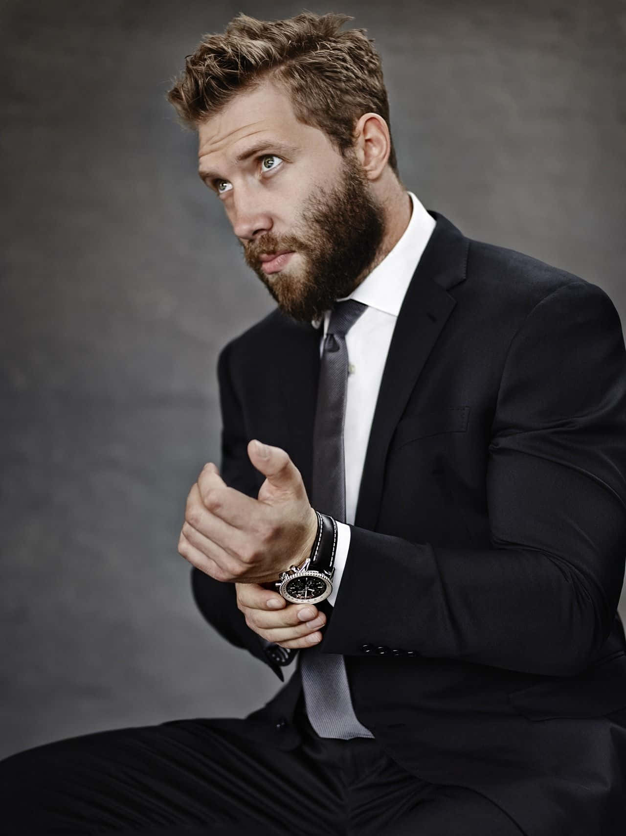 Bearded Manin Suitwith Watch Wallpaper