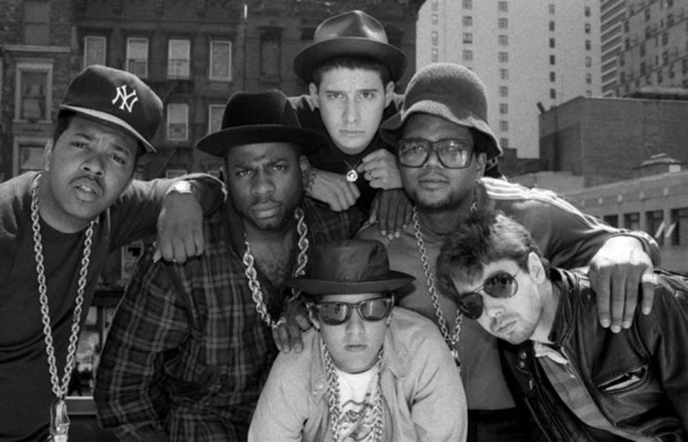 Iconic Hip-Hop Legends - Beastie Boys and Run-D.M.C. in One Frame Wallpaper