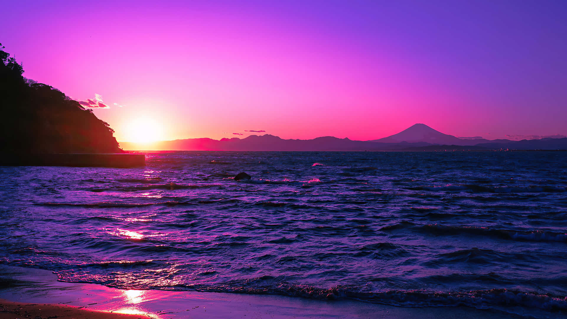 En lilla solnedgang over havet Wallpaper