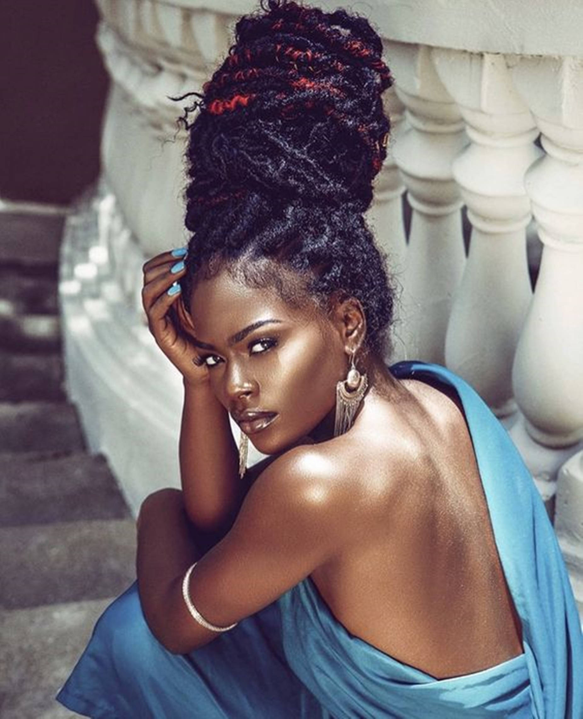 Caption: Empowered Elegance - Beautiful black woman in blue attire Wallpaper