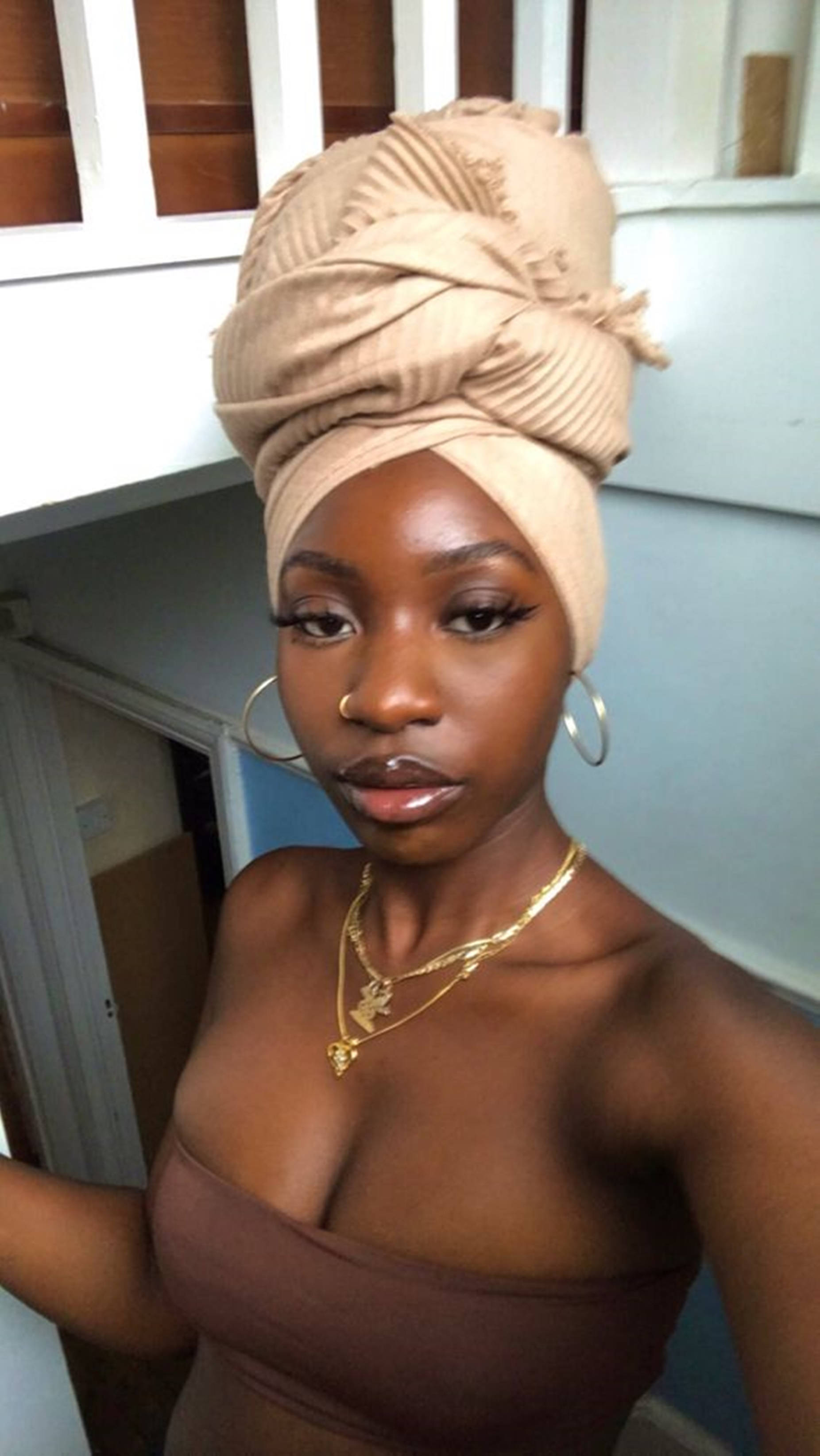 Beautiful Black Woman Fashionable Head Wrap Background
