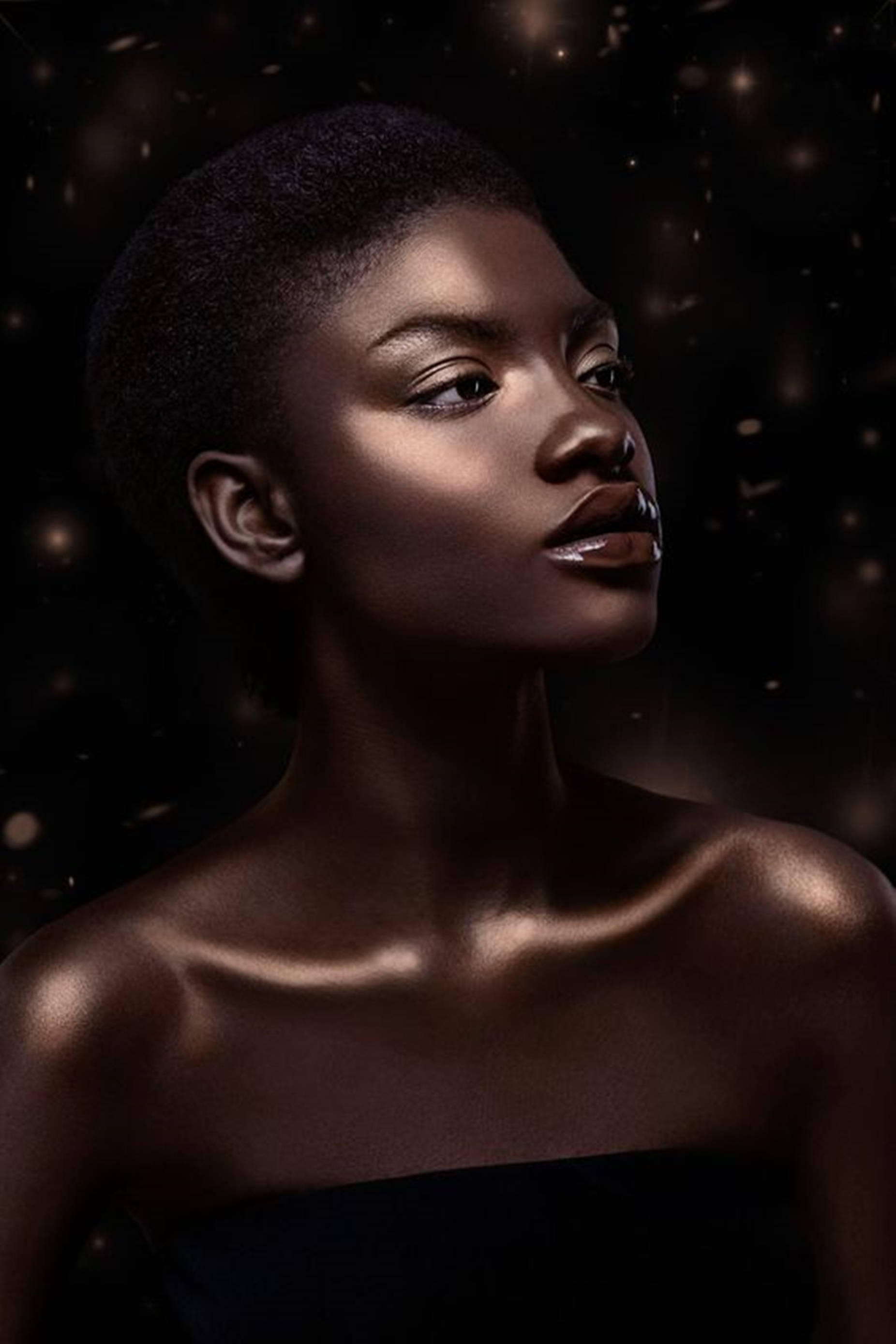 Empowered Beauty: A Radiant Black Woman Wallpaper
