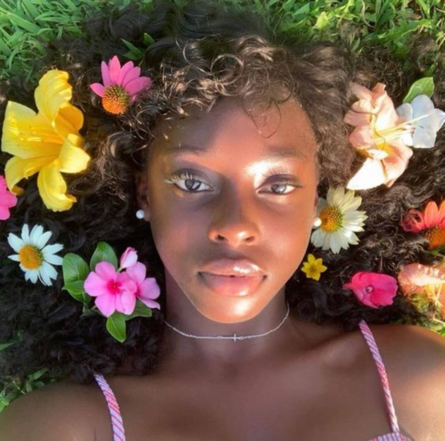 Beautiful Black Woman On Flower Field Wallpaper
