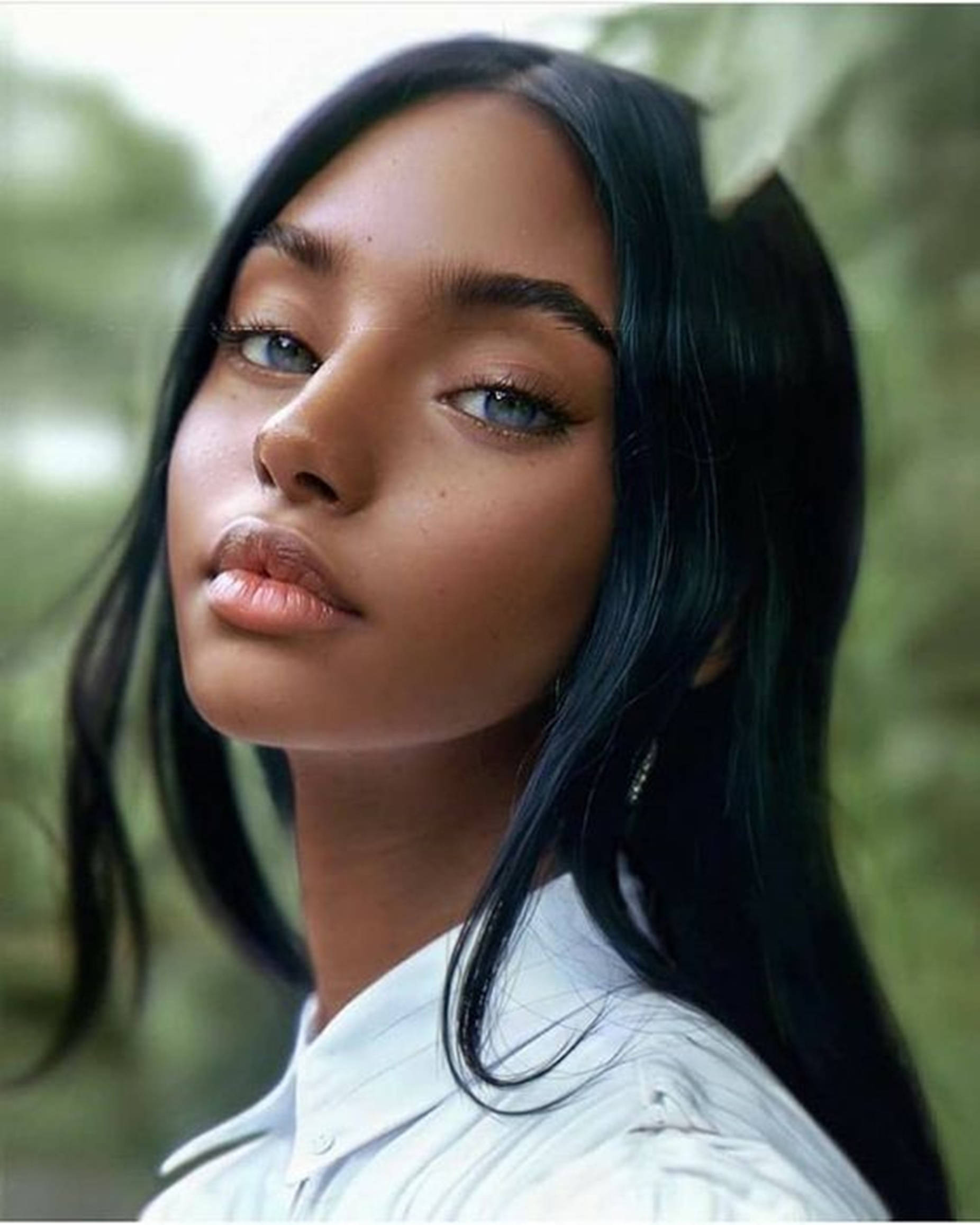Download Beautiful Black Woman With Blue Eyes Wallpaper