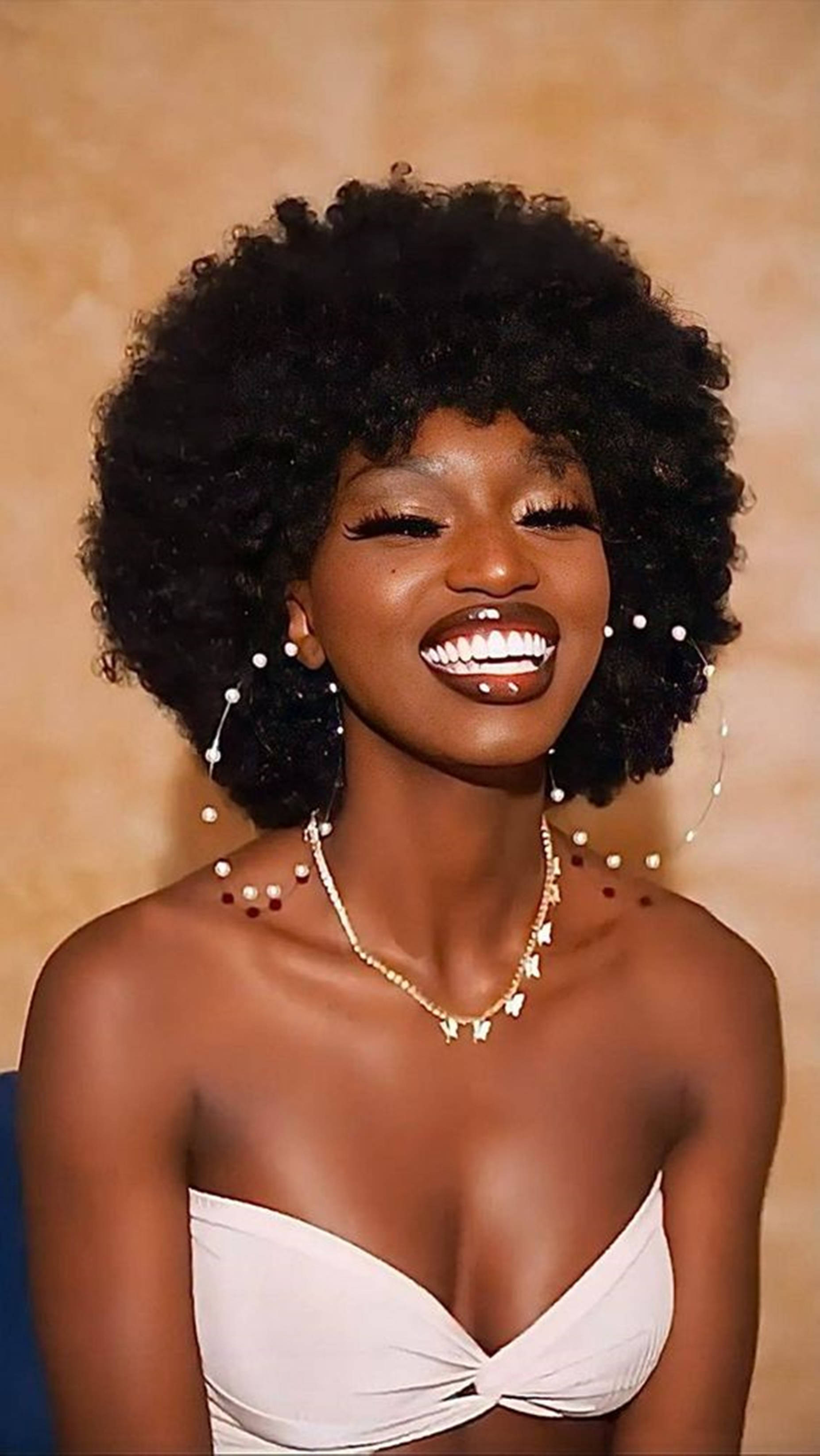 Caption: Elegant Radiance: Beautiful Black Woman Rocking Pearl Hoops Wallpaper