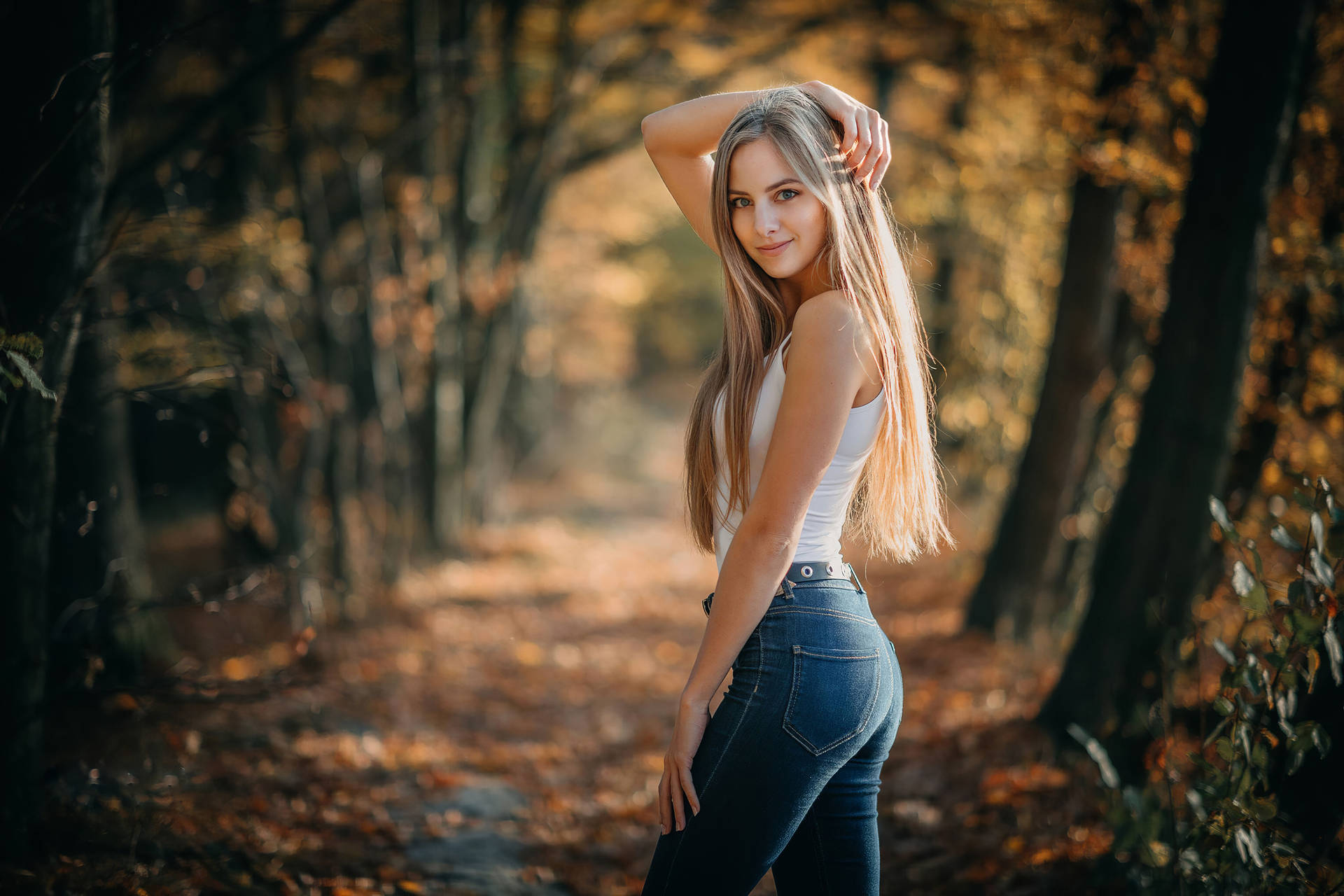 Beautiful Blondes Posing In A Forest Wallpaper
