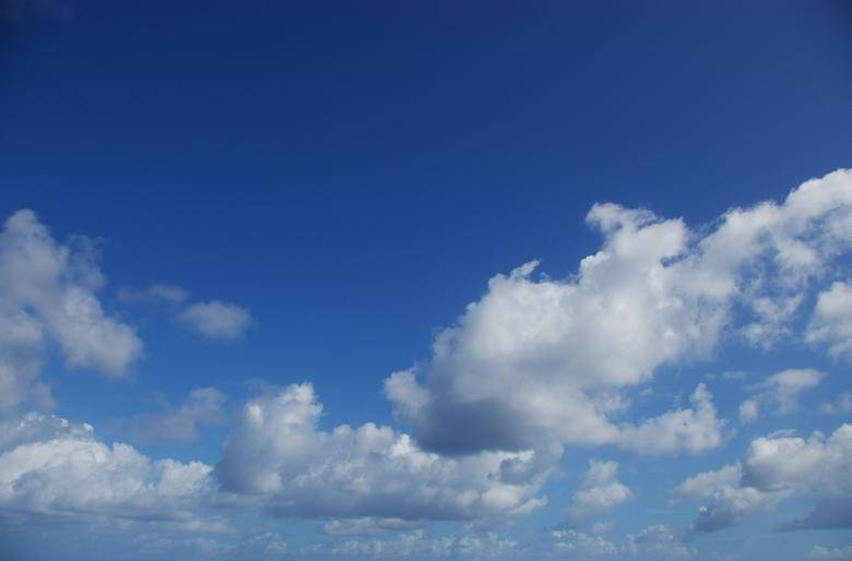 Beautiful Blue Cloud-filled Sky Wallpaper