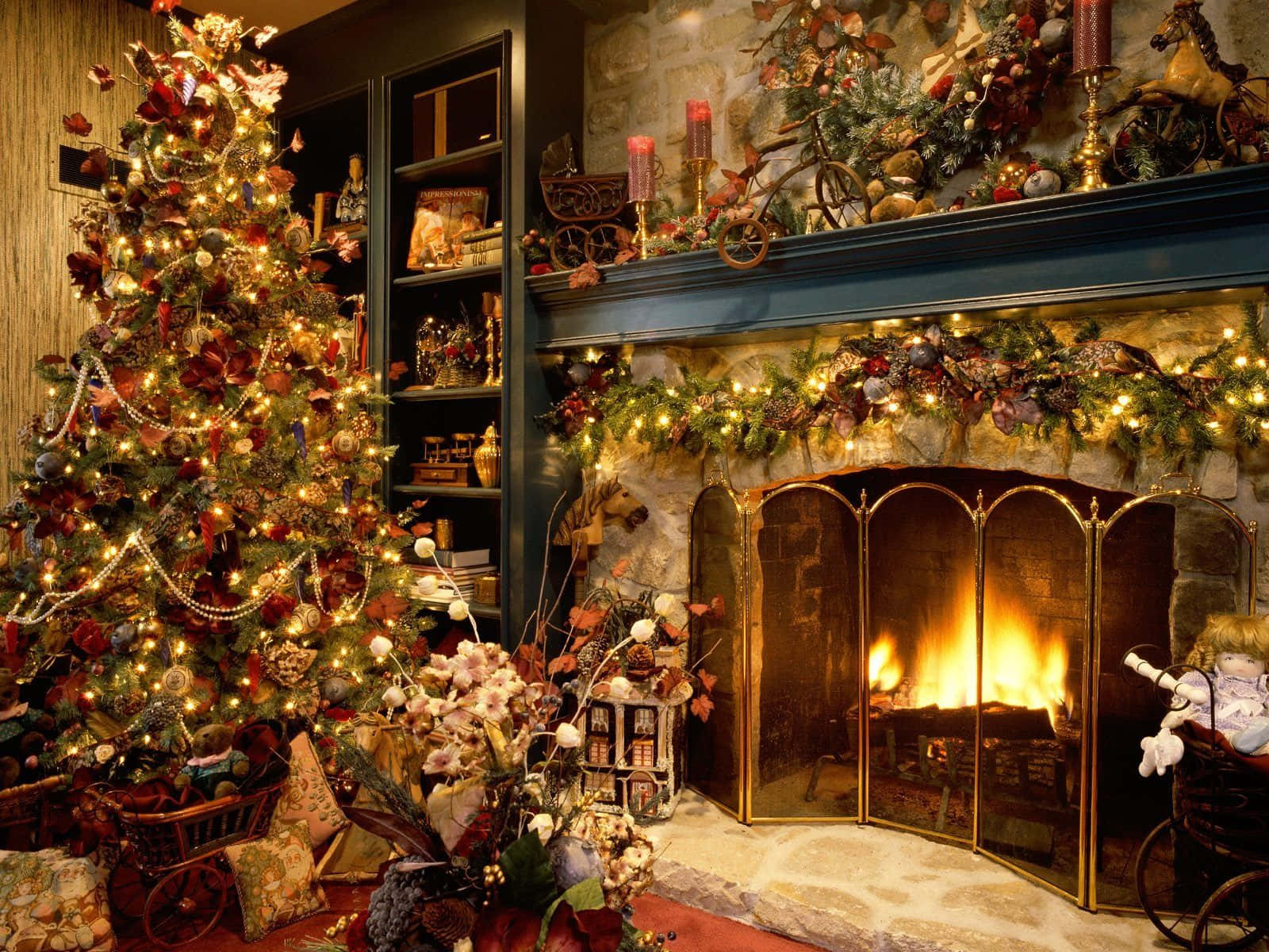A Fireplace With A Christmas Tree And Decorations Wallpaper