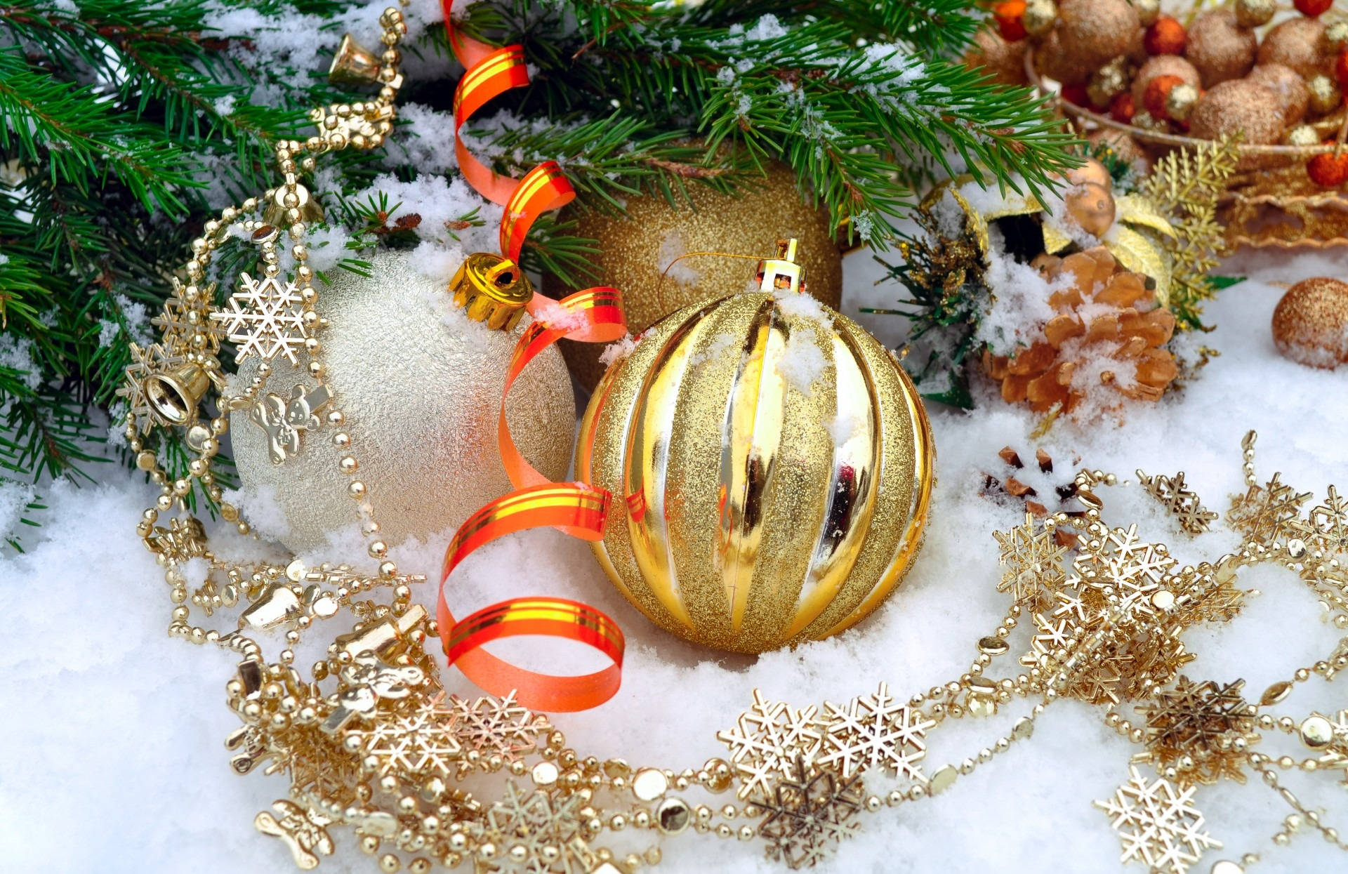 Beautiful Christmas Ornaments In Gold Wallpaper
