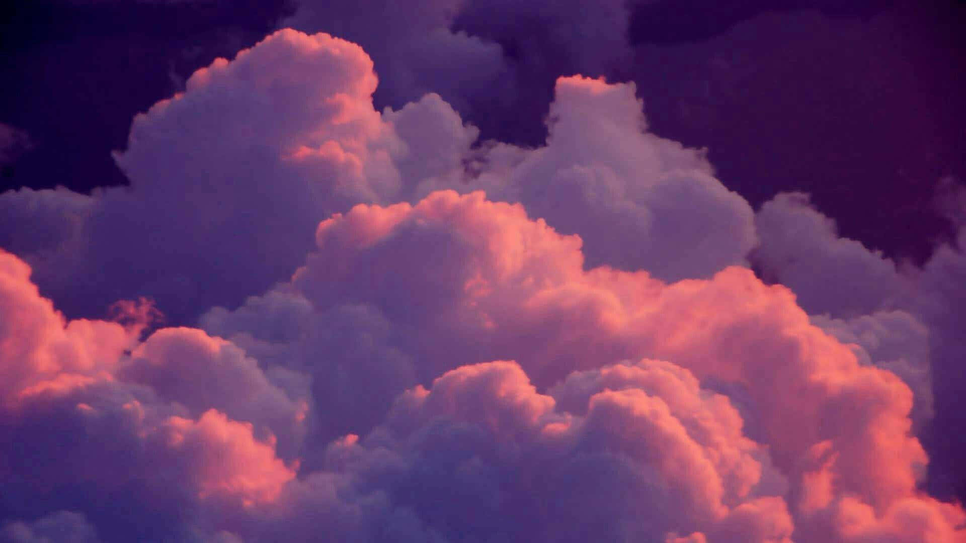Einrosa Und Lila Himmel Mit Wolken Wallpaper