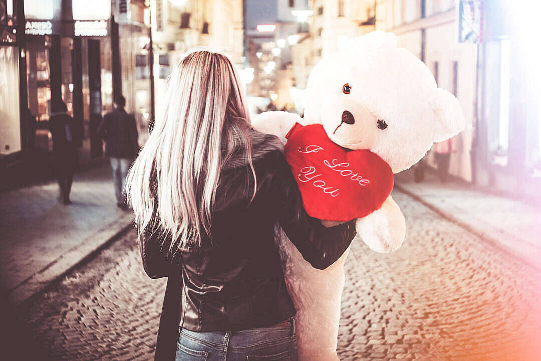 Beautiful Cute Woman With A Teddy Bear