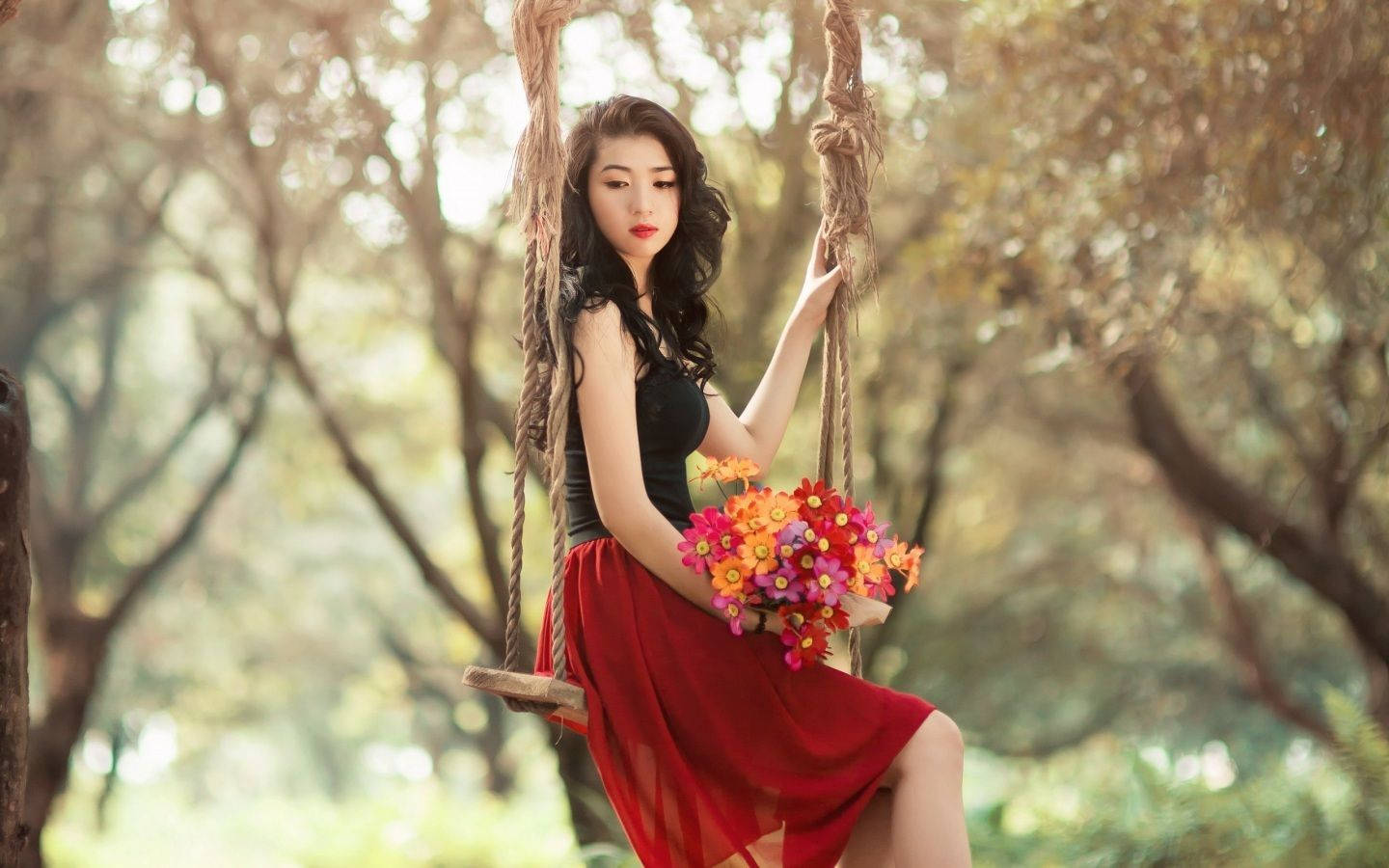 Beautiful Girl Posing On A Swing Background