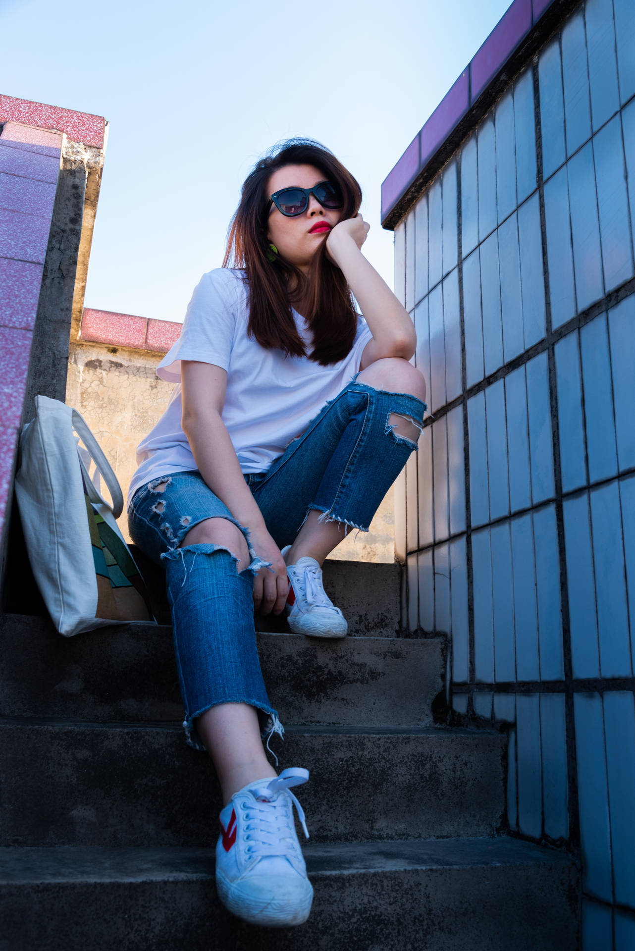Beautiful Girl Sitting On City Steps Wallpaper