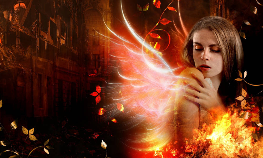 Awe-inspiring Image of a Girl with Fire Wings Wallpaper
