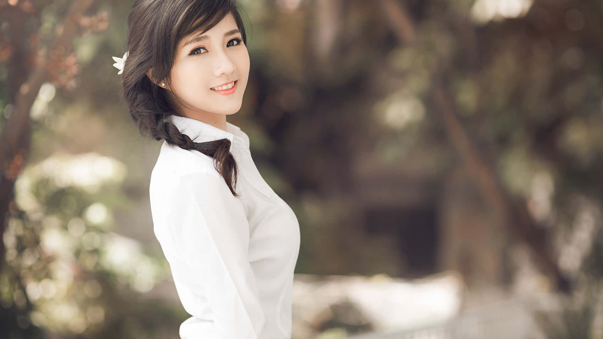 Asian Girl In White Shirt Posing For A Photo Wallpaper