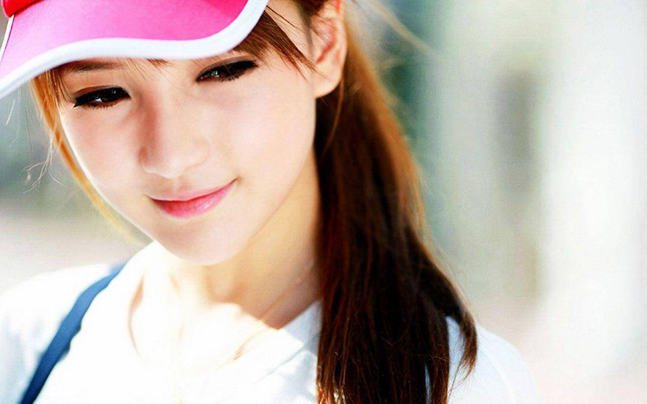 Beautiful Girls Pink Baseball Hat Wallpaper