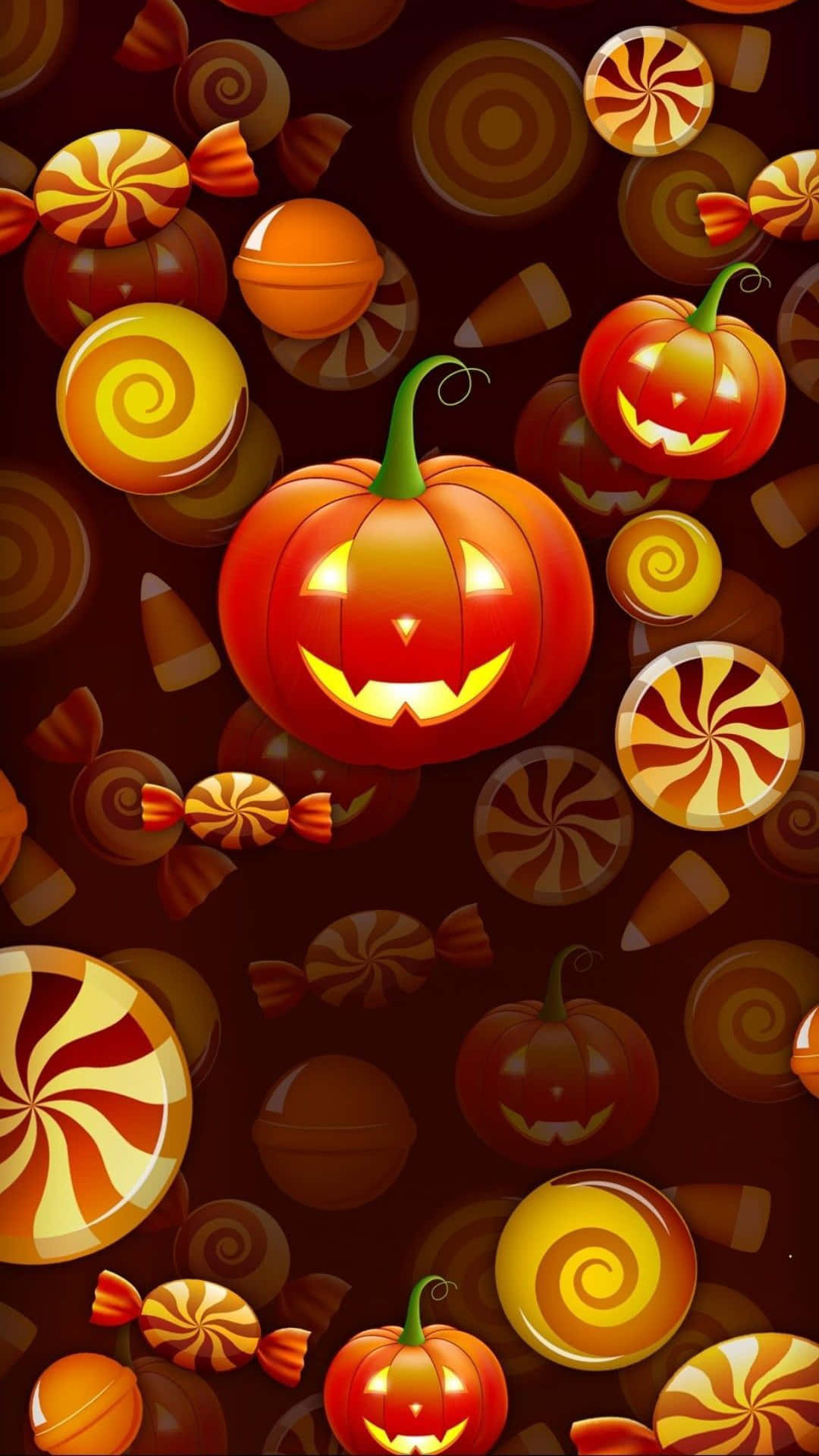 Beautiful Halloween Candies And Pumpkins Wallpaper