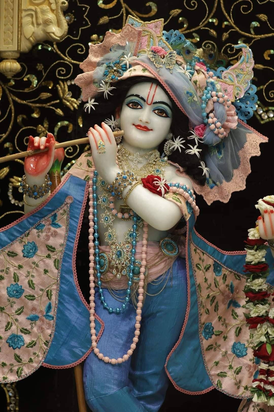 Download Beautiful Krishna Deity Statue Wallpaper | Wallpapers.com