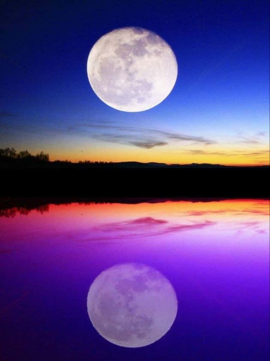 A beautiful moon mesmerizingly glowing in the night sky