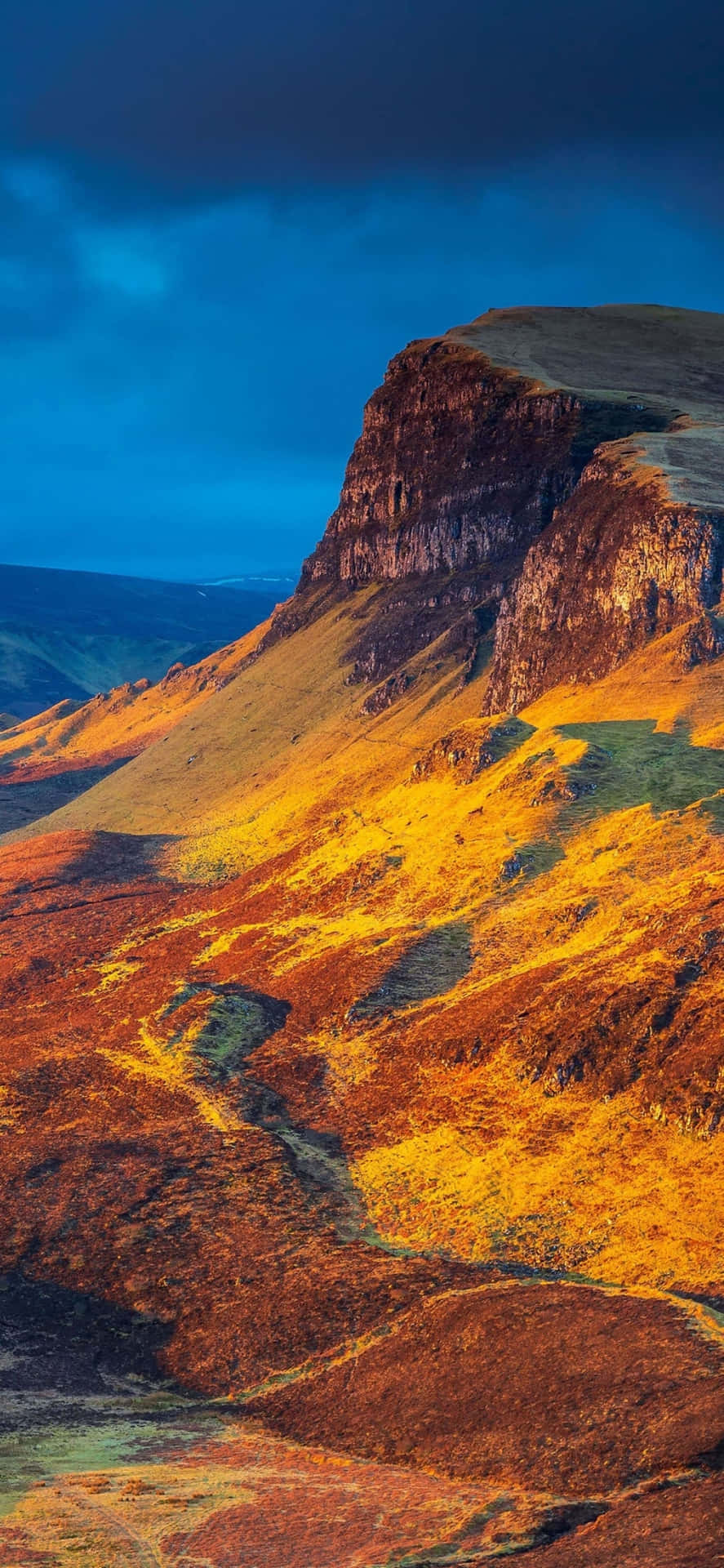 A Mountain Range With A Yellow And Orange Landscape Wallpaper