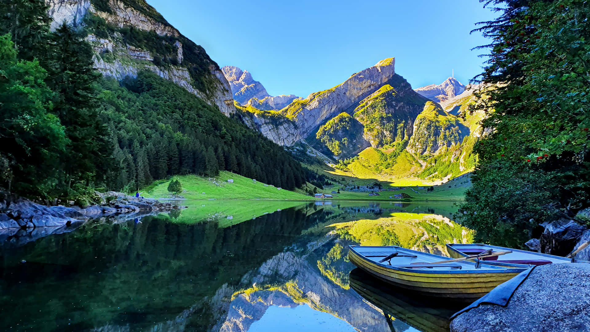 "A majestic lake surrounded by beautiful mountains." Wallpaper